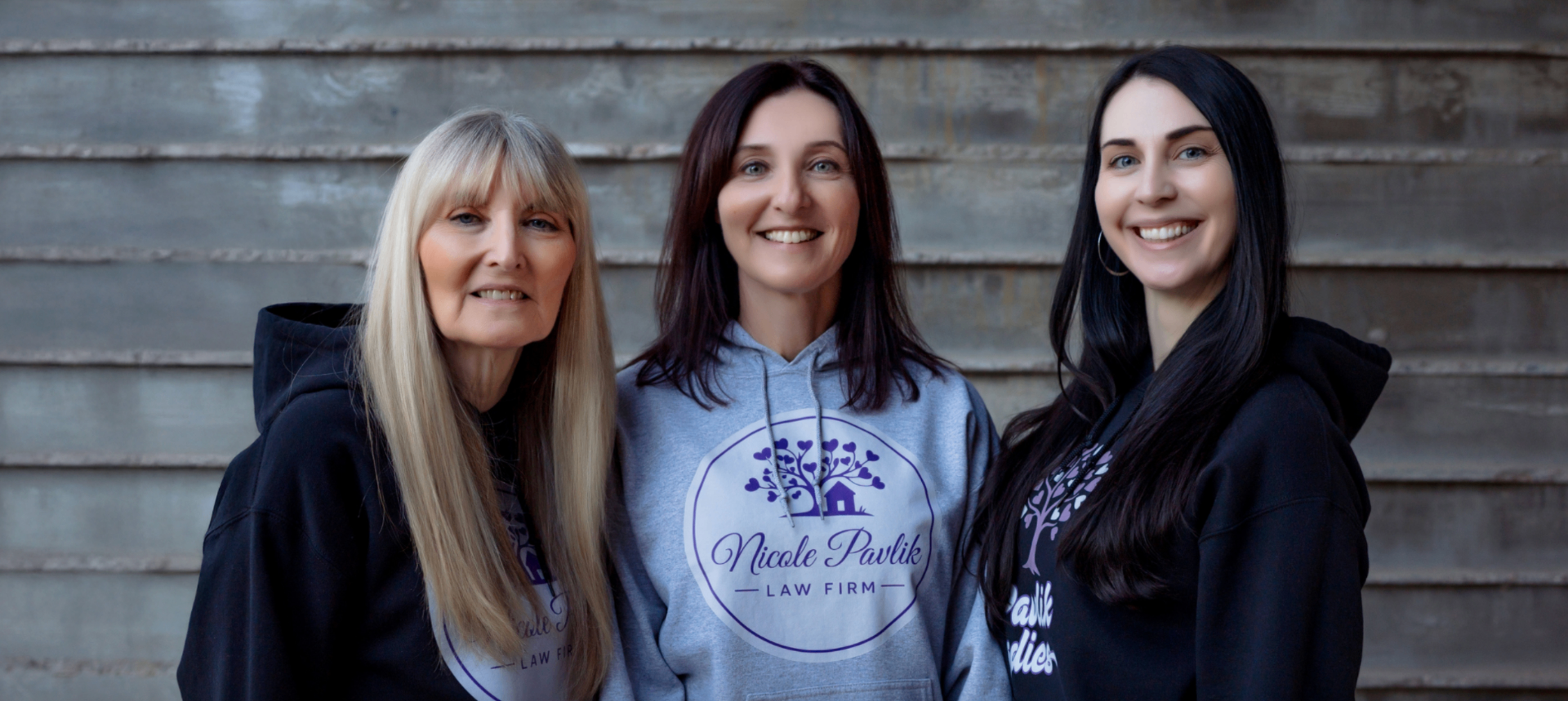 Nicole, Linda, and Shannon Pavlik together, the small team behind Nicole Pavlik Law